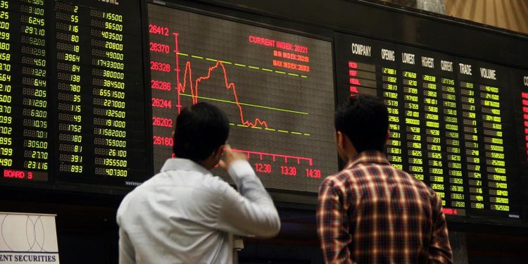 Px11-013
KARACHI: Feb11  Brokers look at digital screen during bearish trend at Karachi Stock Exchange.
ONLINE PHOTO by Sabir Mazhar