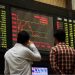 Px11-013
KARACHI: Feb11  Brokers look at digital screen during bearish trend at Karachi Stock Exchange.
ONLINE PHOTO by Sabir Mazhar
