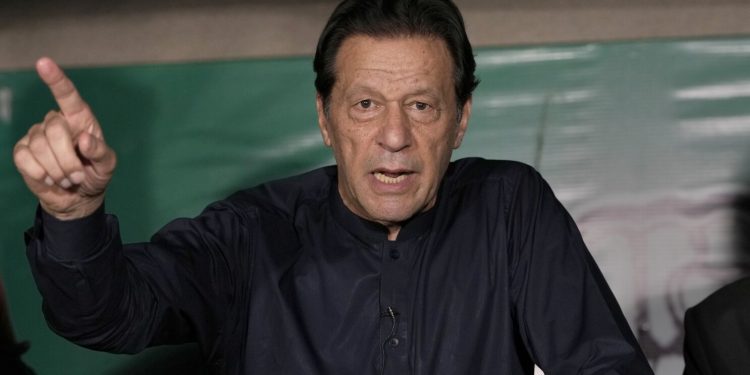 FILE - Pakistan's former Prime Minister Imran Khan speaks during a news conference at his home, in Lahore, Pakistan, Thursday, May 18, 2023. Pakistan is holding elections for a new parliament on Thursday. No less than 44 political parties are vying for a share of the 266 seats that are up for grabs in the National Assembly, or the lower house of parliament, with an additional 70 seats reserved for women and minorities. (AP Photo/K.M. Chaudary, File)